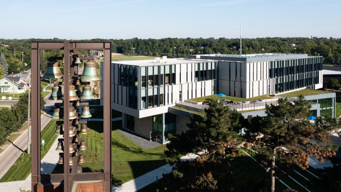 An aerial view of Kettering's bell tower in the foreground and the Learning Commons in the background